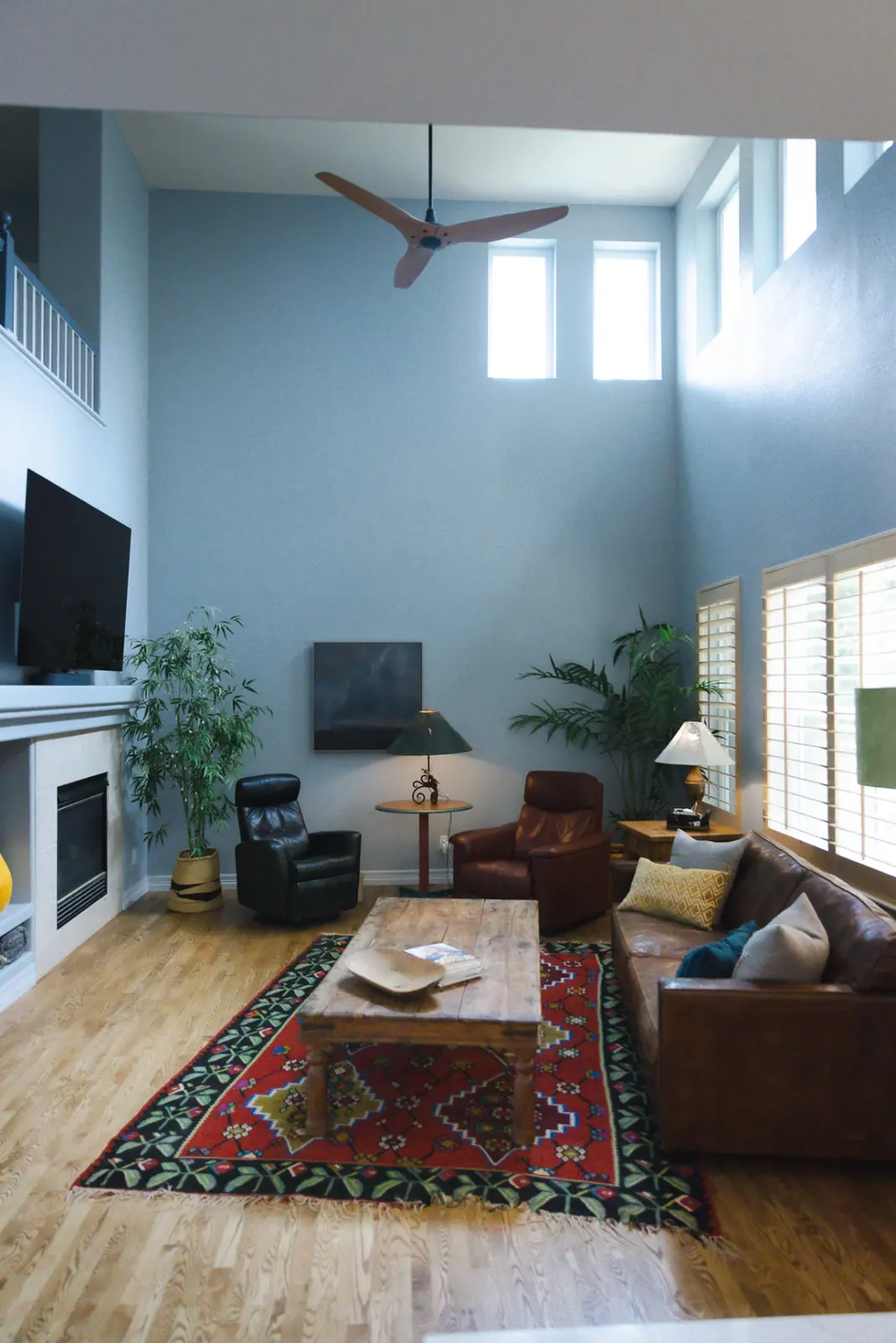 Finished two-story great room with freshly painted walls and crisp white trim