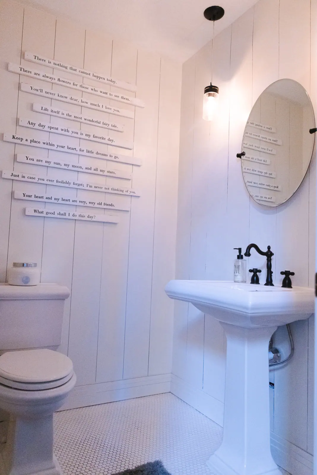Powder room with white plank walls and fresh trim paint