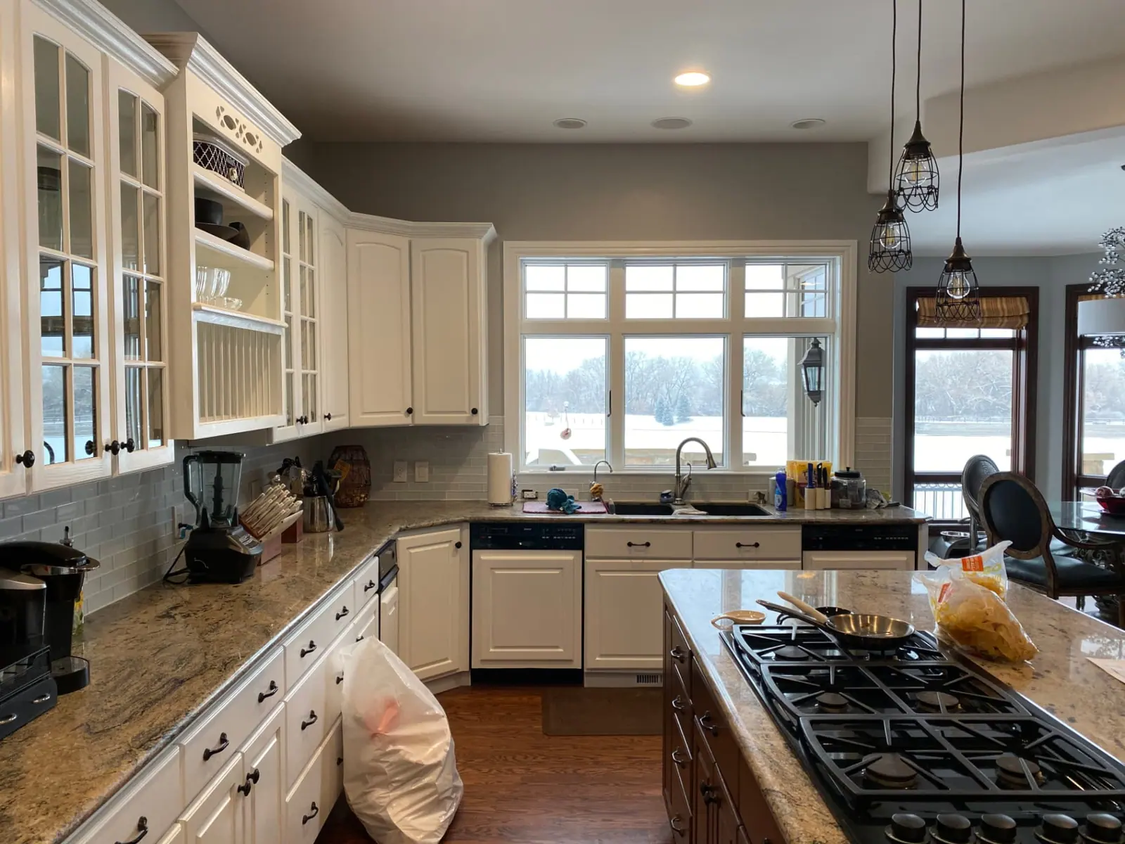 Bright white kitchen with repainted cabinetry in Littleton