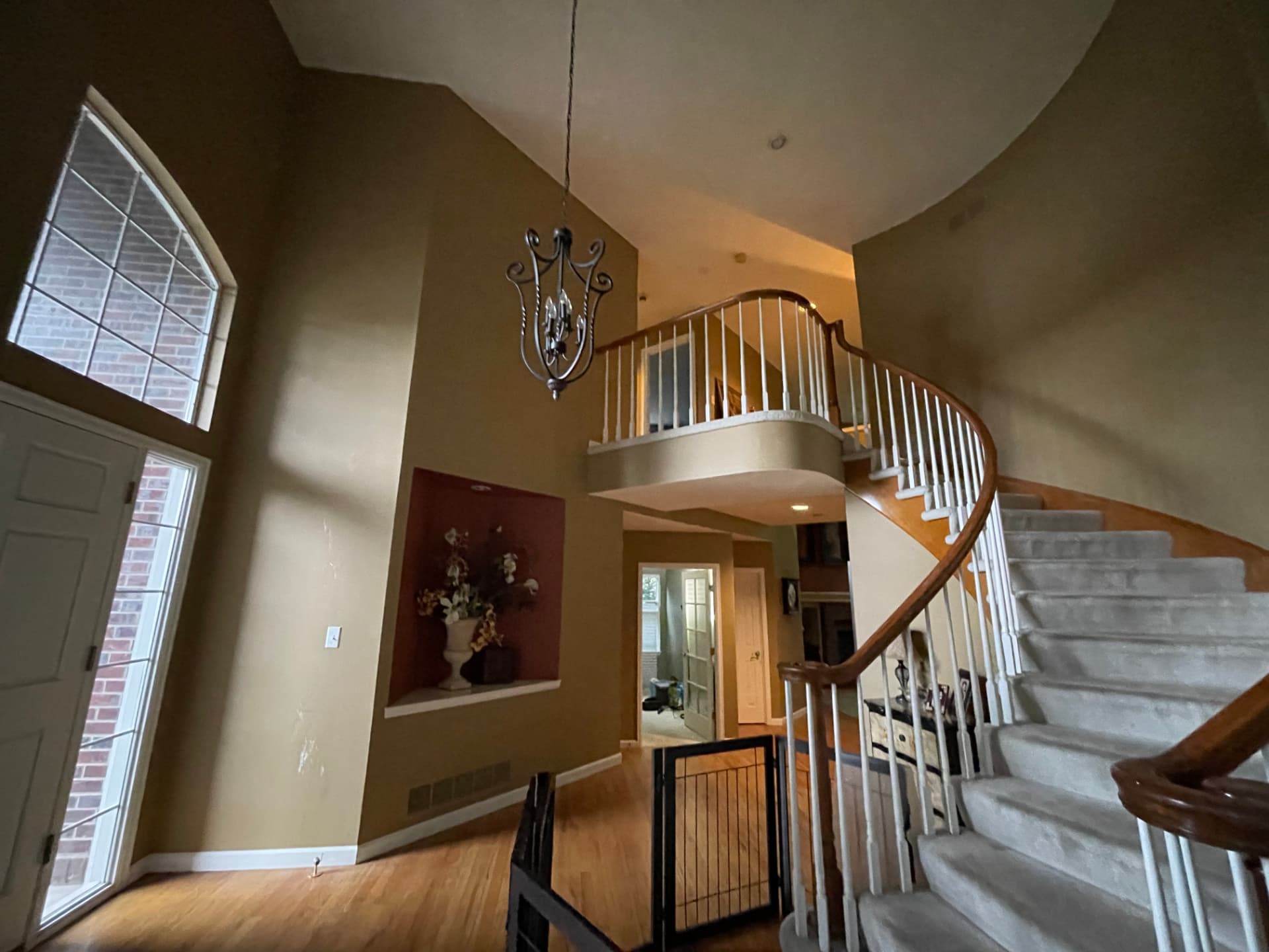 Two-story entry before the interior repaint