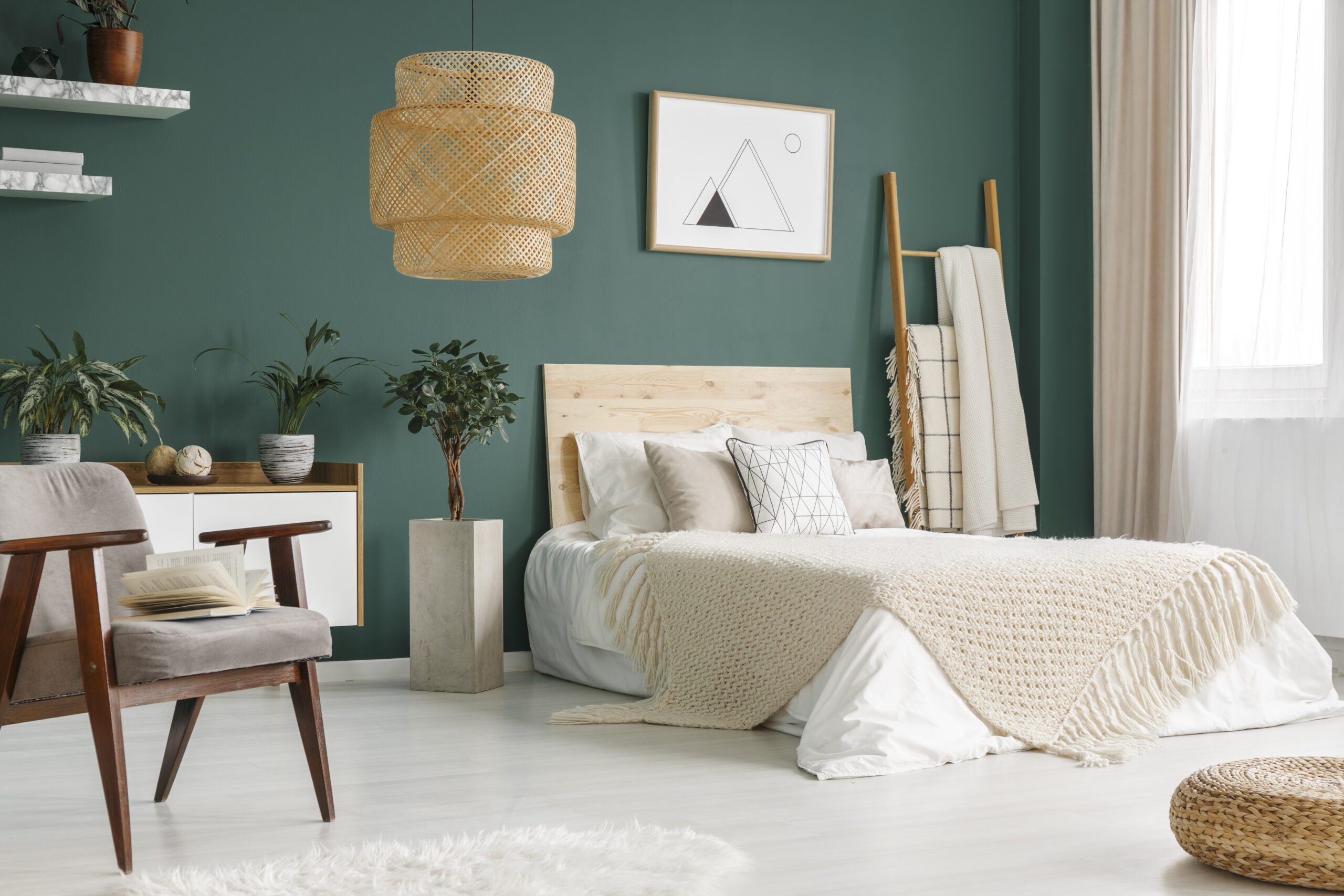 Bedroom repainted in a deep green interior finish