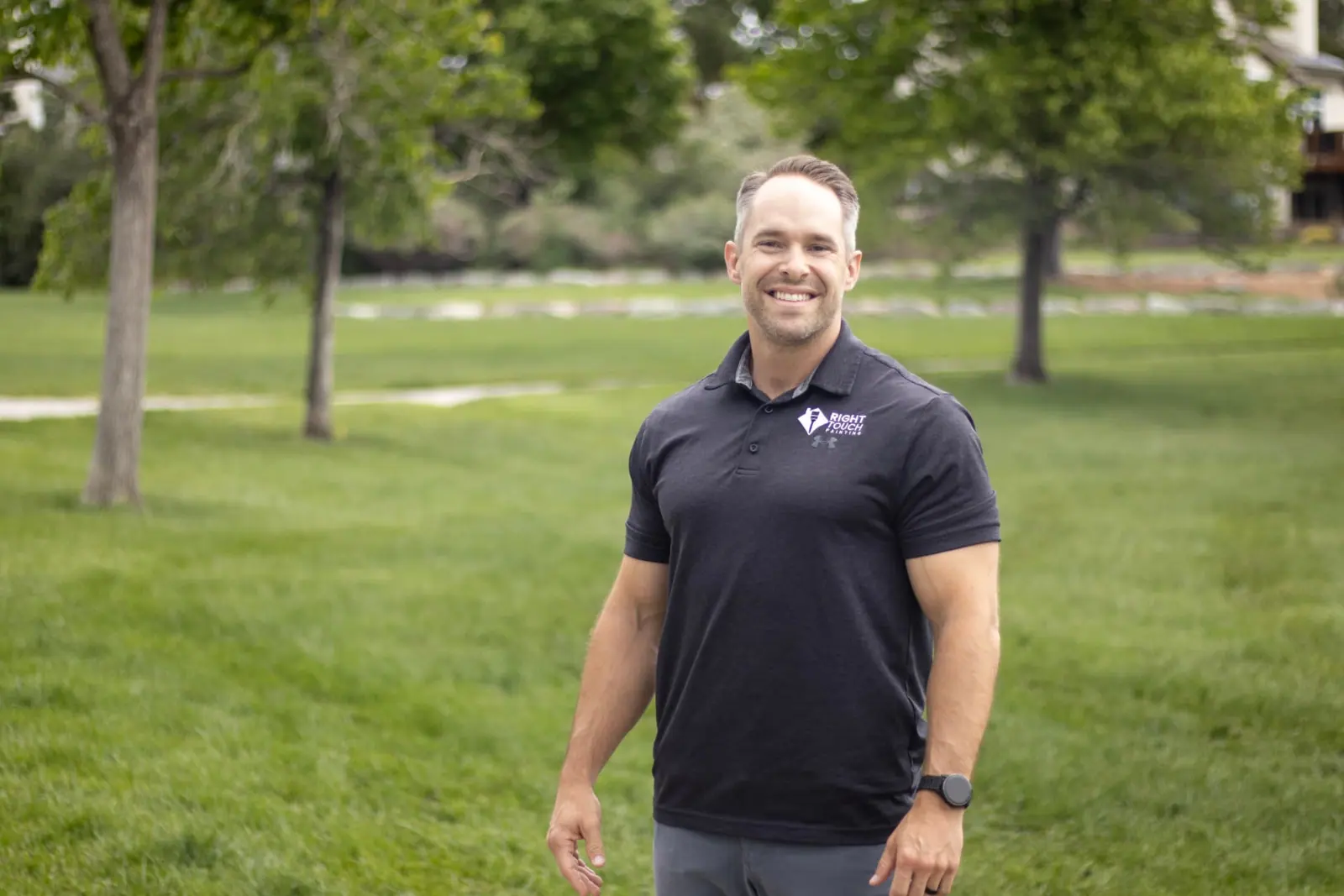David, co-owner of Right Touch Painting, in a company polo